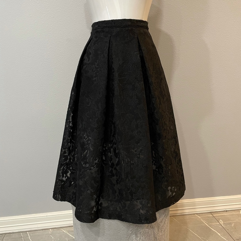 Bebe pleated rose lace skirt